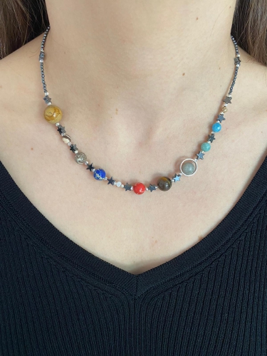 Solar System Necklace Is a Beautifully Subtle Way to Celebrate the Universe