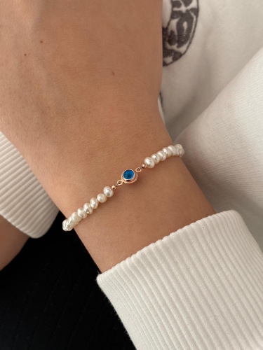 Pearl evil eye bracelet deals